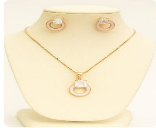 Gold Halo Necklace with Geometric Crystal